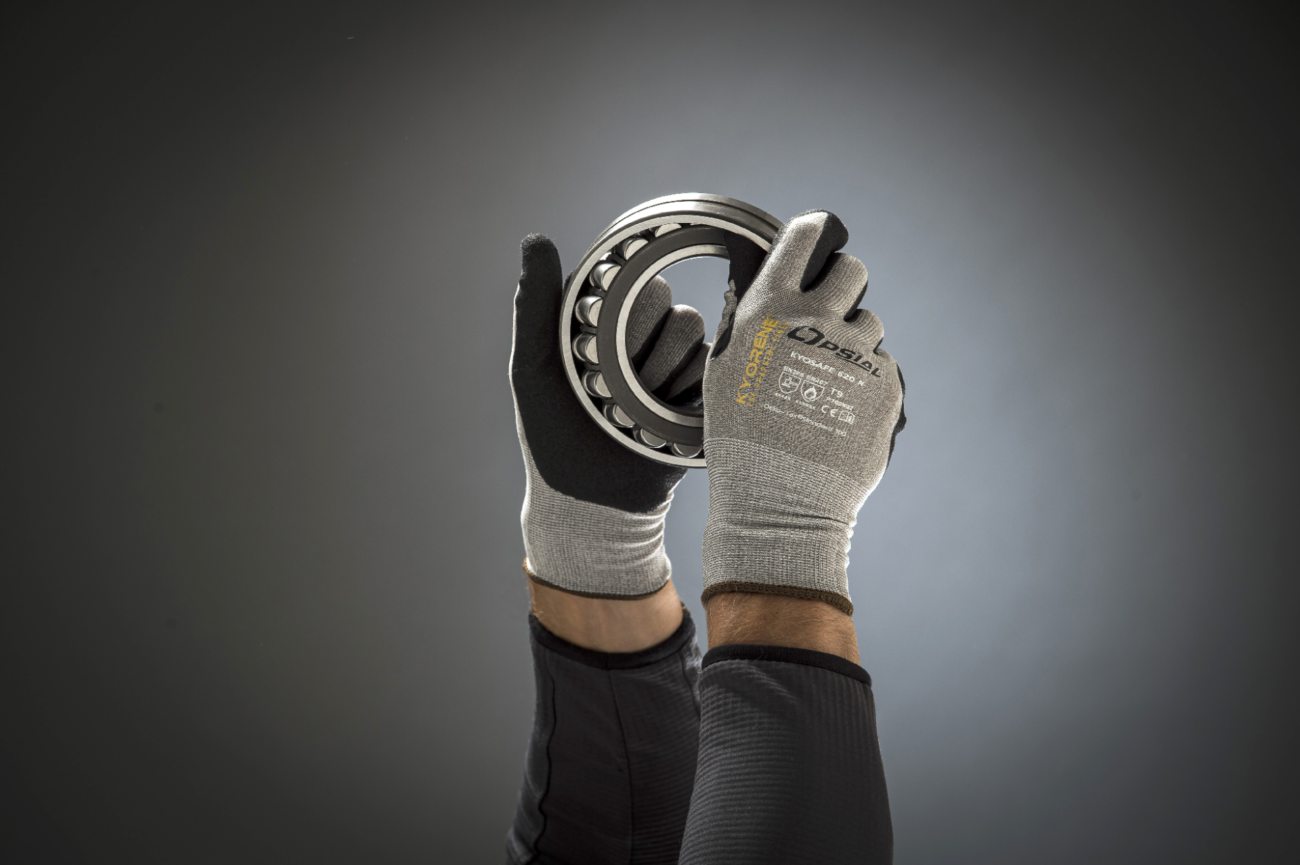 opsial gloves holding a bearing