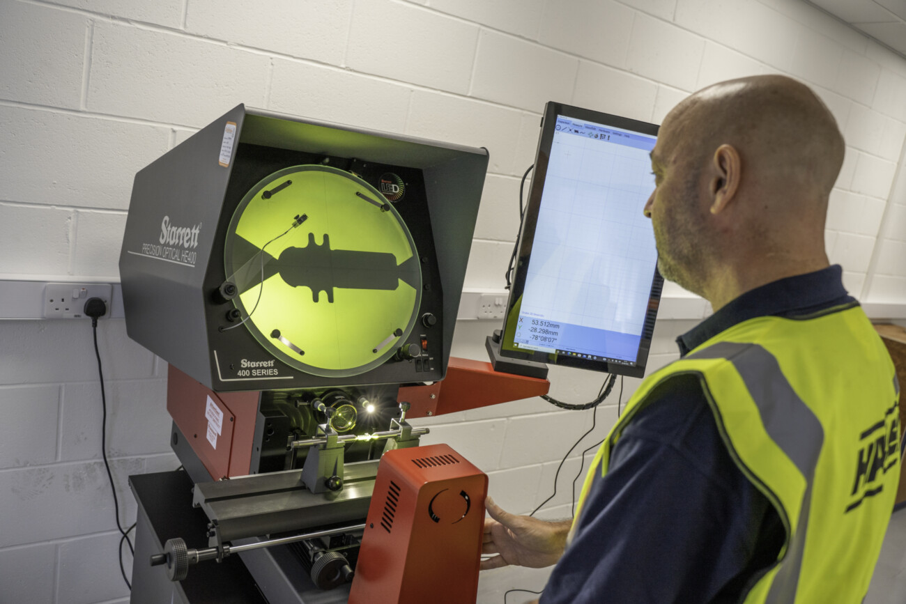 Hayley Bespoke Components Quality Manager inspects a new part