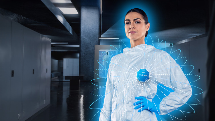 woman wearing DuPont Tyvek 400 coverall